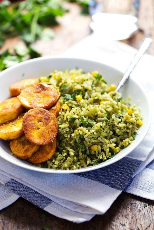 Green Mexican Rice with Corn in a bowl.