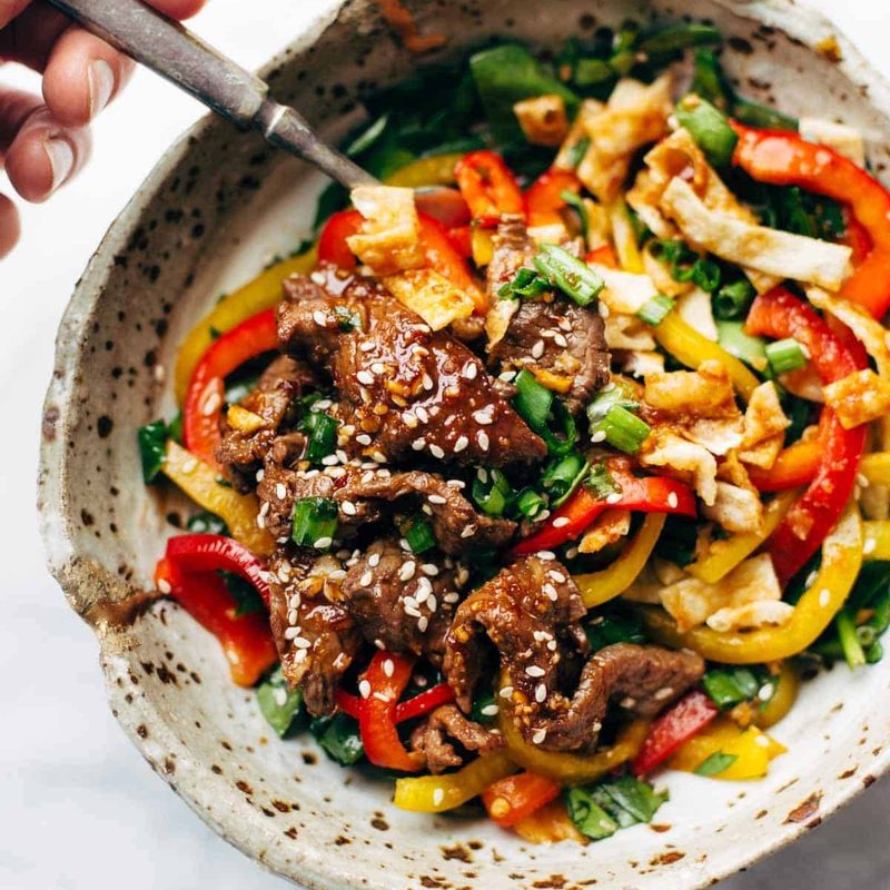 A picture of Korean BBQ Steak Bowls with Spicy Sesame Dressing