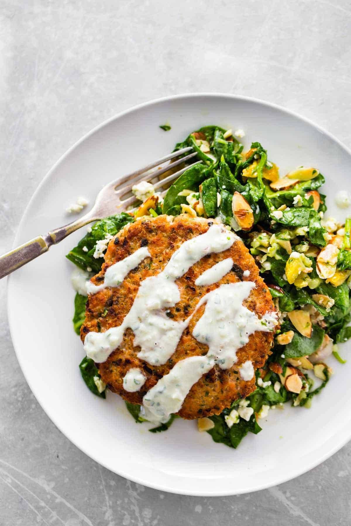 Lemon Herb Salmon Burger on a plate.