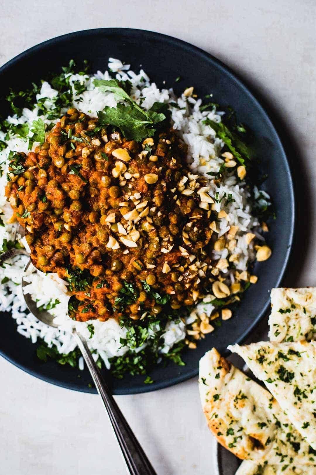 Red curry lentils with rice and naan.